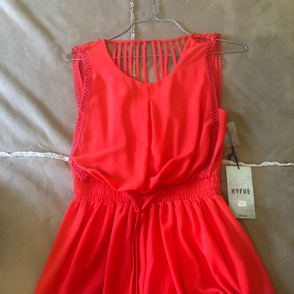 Red romper bought new never wore.